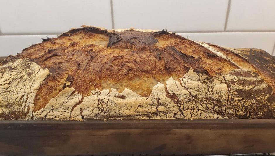 Baking sourdough bread in clay baker - Sourdough&Olives