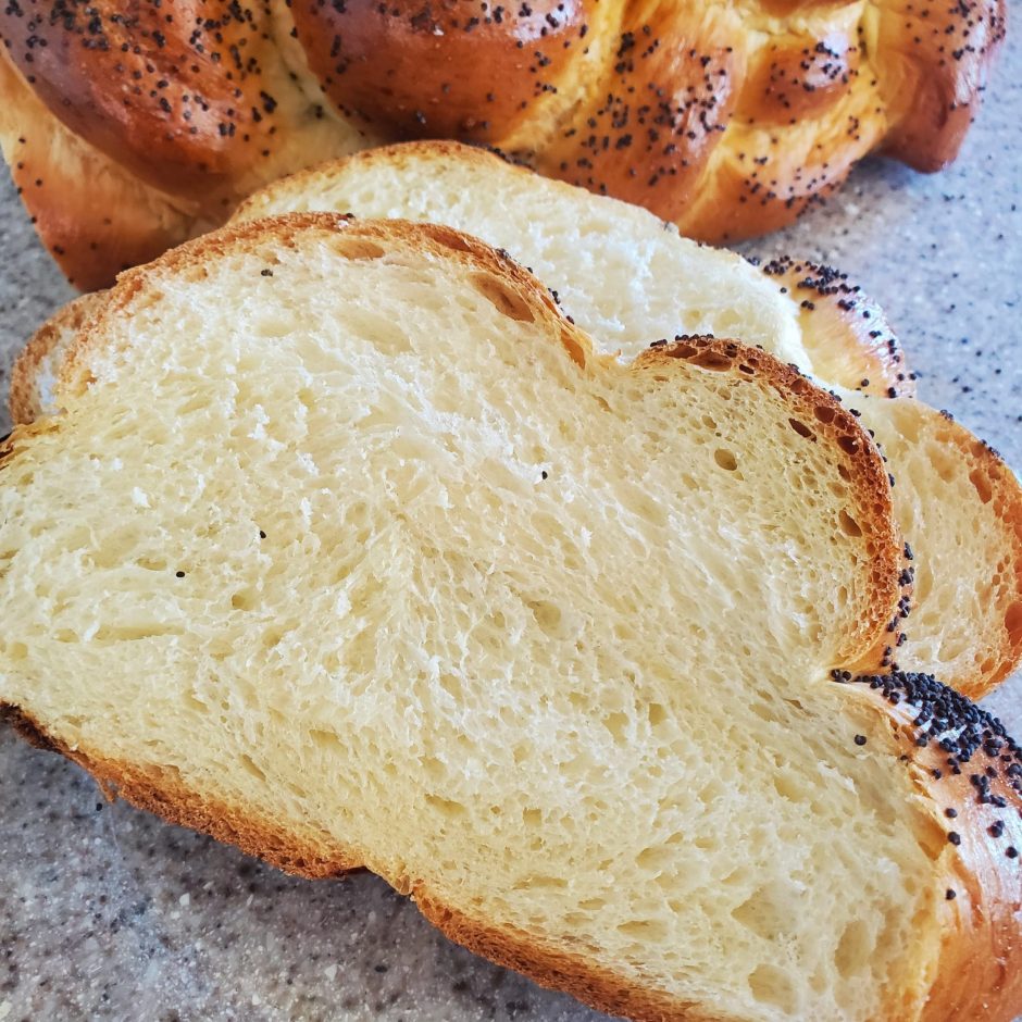 Challah a little too big for the pan but smells great! : r/Breadit